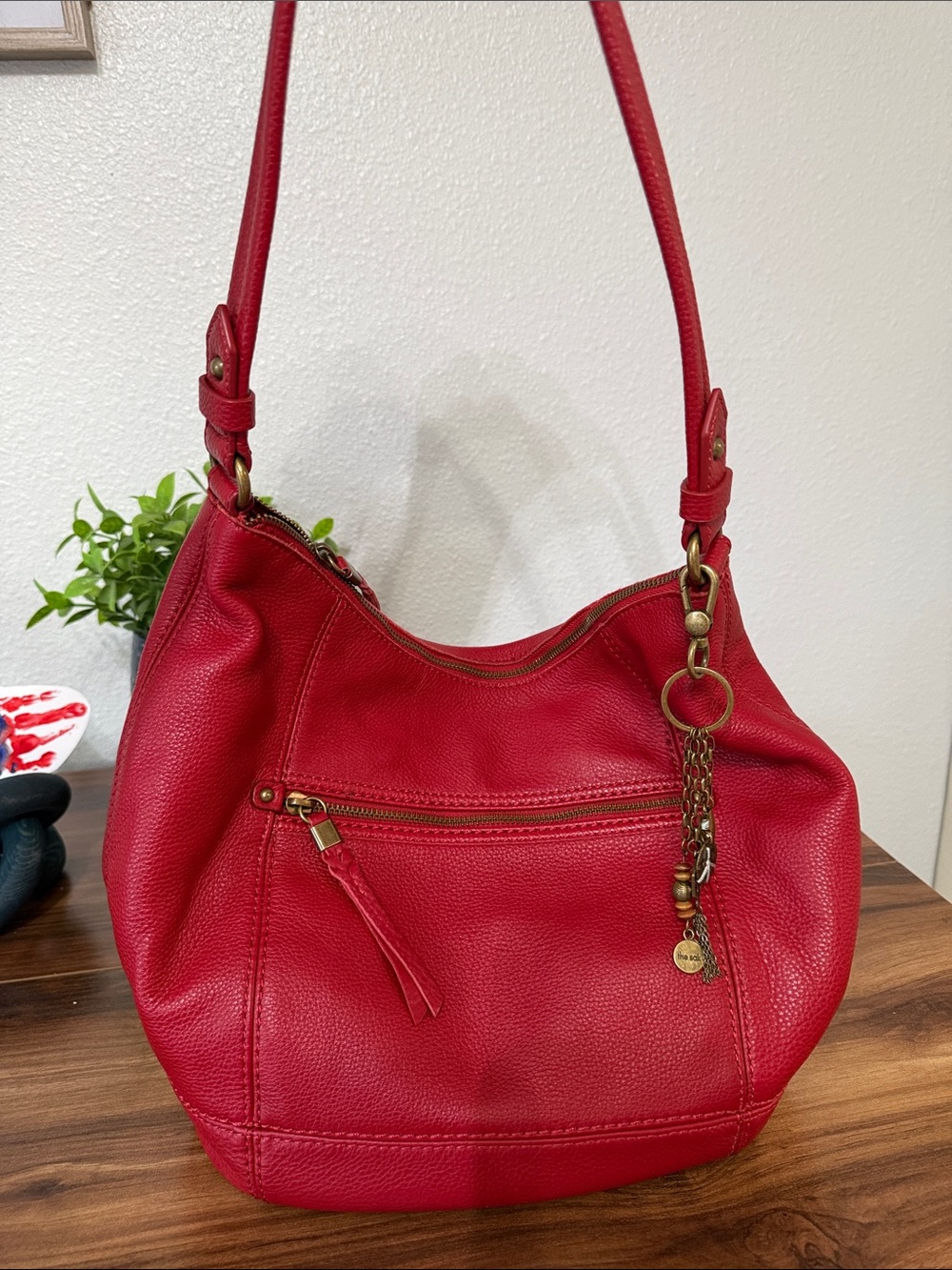 The Sak Red Leather Shoulder Hobo with Chain Charm